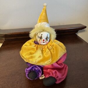 Vintage Clown Porcelain Face Purple Yellow Pink 9"x 5"x2.5" Doll